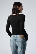 Asymmetrical Lace-Up Black Long Sleeve Top – Edgy Cutout Detail